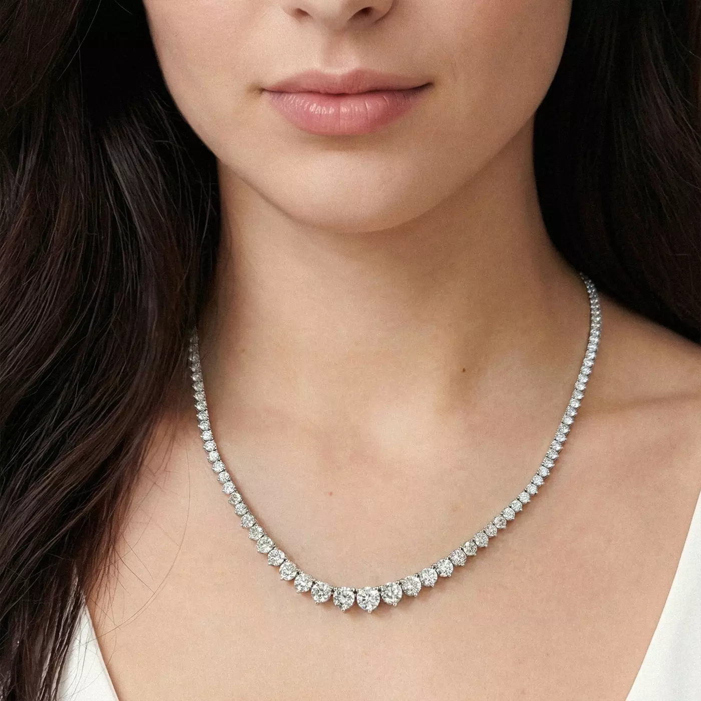 Bestselling Round Lab Diamond Graduated Riviera Necklace from Rare Carat shown on a woman's neckline
